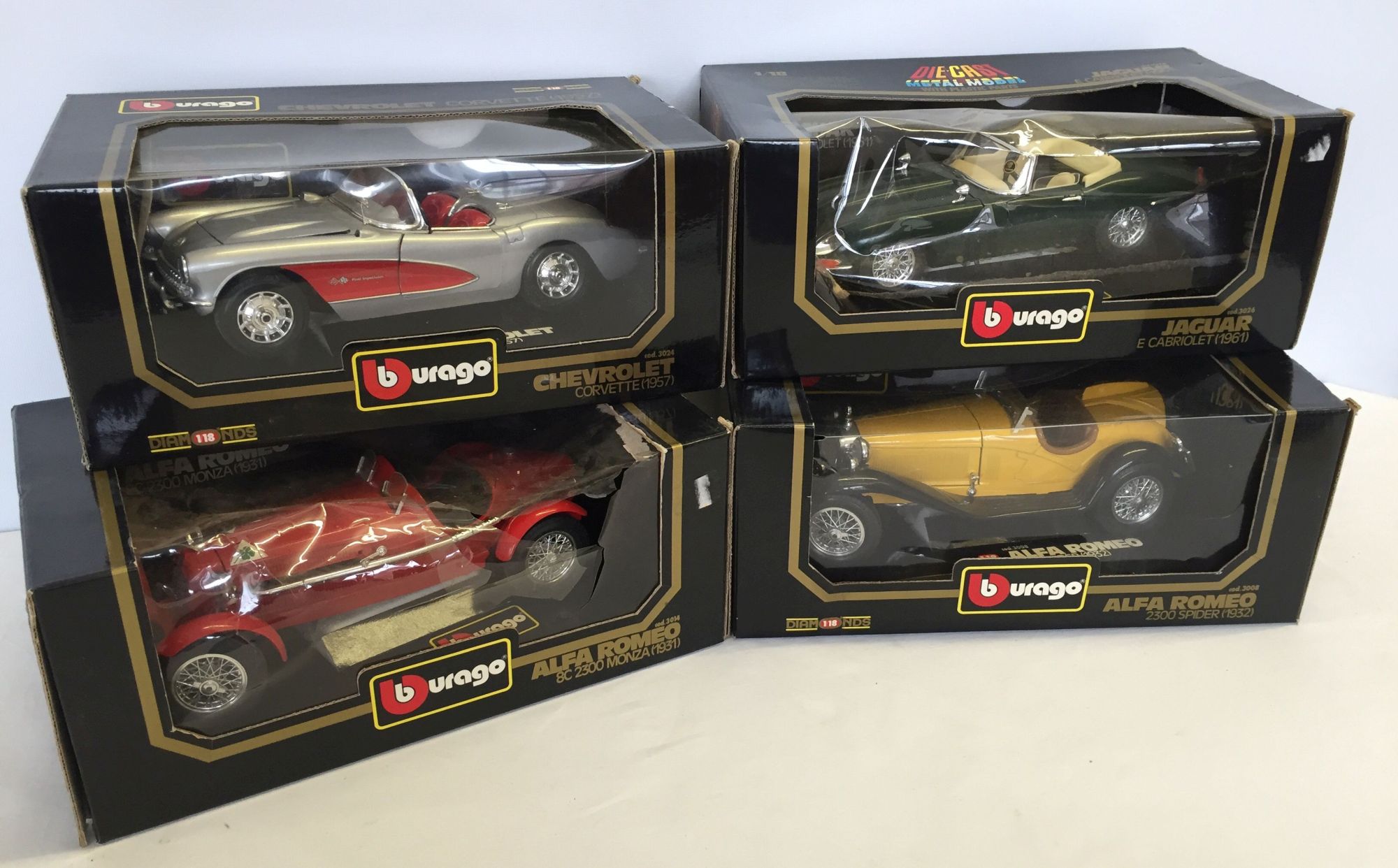 4 boxed Bburago Cars 1:18 scale, to include - Jaguar E Cabriolet, Alpha Romeo Spider 2300, Chevrolet