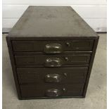 Metal 4 drawer filing cabinet (approx 30cm high x 30cm wide x 61cm deep).