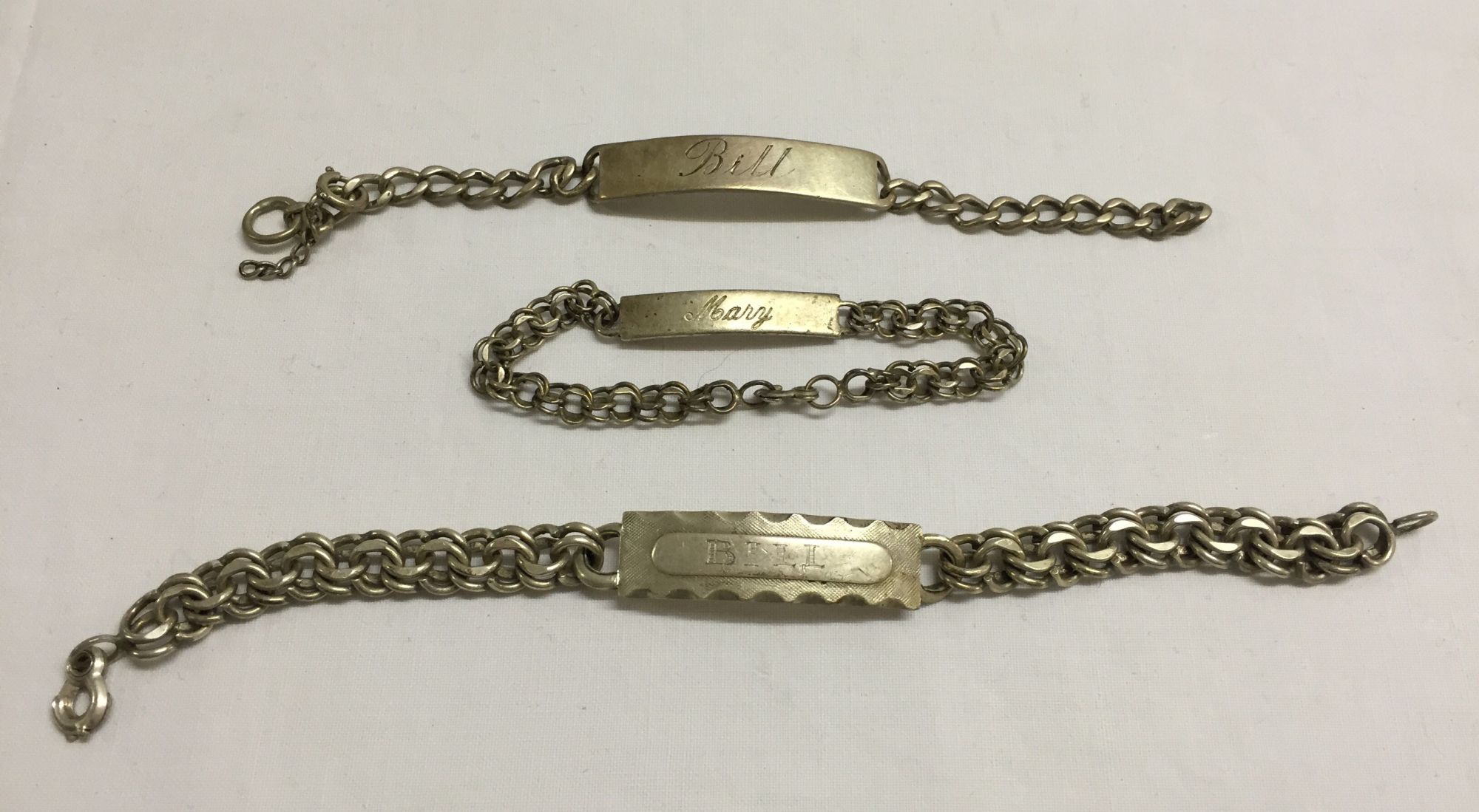 3 I.D. bracelets, all silver, 2 engraved 'Bill and 2 'Mary'. Total weight aprox 62g.