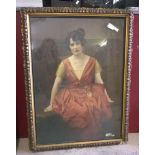 A large Edwardian coloured framed & glazed print of a seated lady.