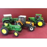 4 toy model tractors to include John Deere