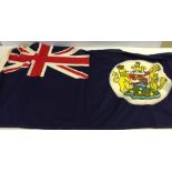 A Hong Kong, blue ensign flag de-commissioned c1999 at the hand-over of Hong Kong to China. 61 x