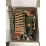 A box of vintage Action Man figures and accessories to include 5 Husky dogs c1960s. Soldier