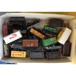 A box of 20 unboxed OO gauge railway trucks to include Colemans Mustard.