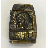 A brass barrel vesta case (approx 3½cm wide x 5cm high).