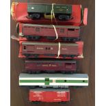 6 Tri-ang OO gauge carriages & trucks to include RAMC Ambulance and track cleaning car.