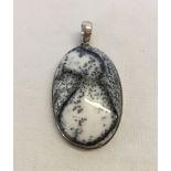 A large oval dendretic agate pendant set in 925 silver, total length 6cm.