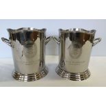 A pair of 'Louis Roederer' silver plated wine coolers.