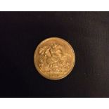 A 1913 George V gold half sovereign coin