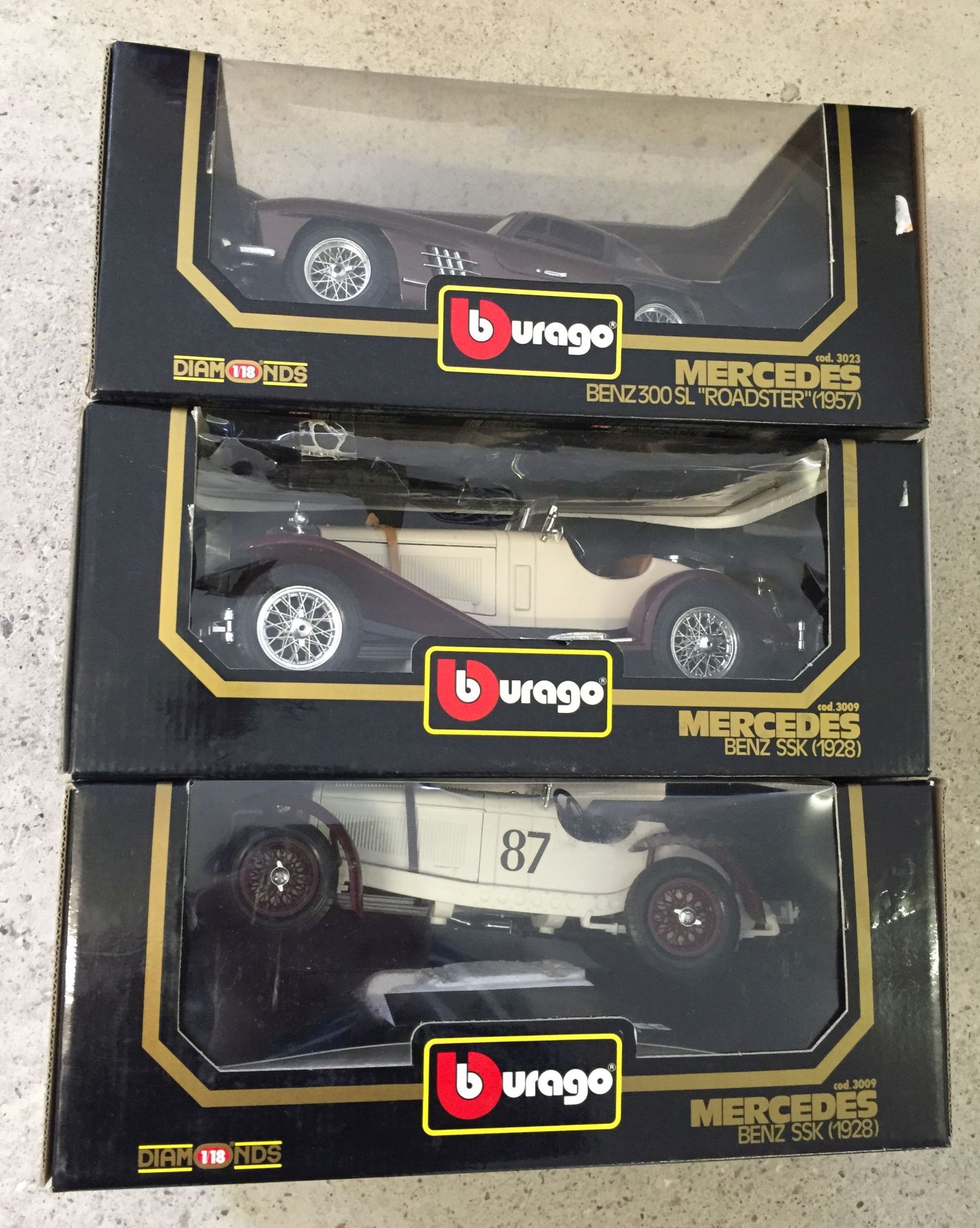 3 boxed 1:18 scale Bburago cars - Mercedes Benz 300SL Roadster, Mercedes Benz SSK, Mercedes Benz