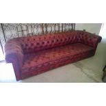 4/5 seater Burgandy leather chesterfield.