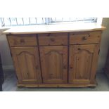 A modern pine 3 door, 3 drawer sideboard. Approx 114 x 47cm.