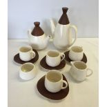 A Carlton ware brown & cream coffee pot, tea pot, sugar bowl, milk jug & 4 cups & saucers in retro