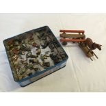 A collection of Britains lead Co-Co Cubs animal figures and other lead items.