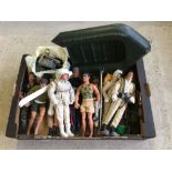 A collection of 10 Action Men together with a dingy and bag of accessories.