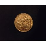 A 1910 Edward VII gold sovereign coin