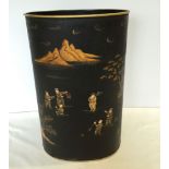 A black Toleware umbrella/stick stand with oriental design.