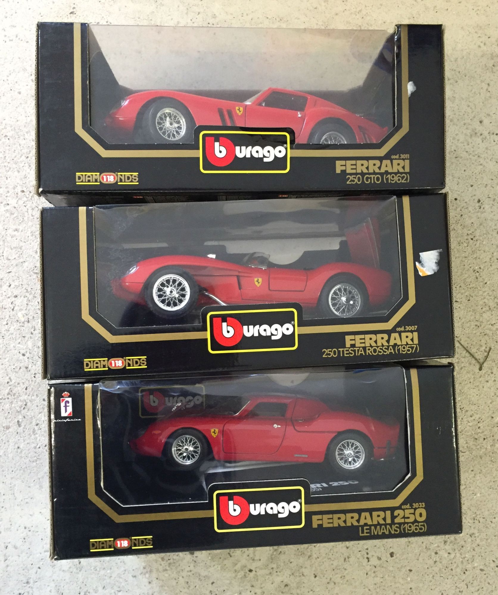 3 boxed 1:18 scale Bburago cars - Ferrari 250 Le Man, Ferrari 250 Testa Rossa, Ferrari 250 GTO