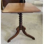 A small vintage tilt-top table on a turned tripod pedestal. Top approx 55cm x 66cm, 71cm tall.