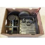 A box of vintage kitchenalia to include baking trays and a set of scales with weights.