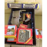 A box of OO gauge railway items to include buildings, controllers and a Rivarossi locomotive &