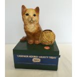A c1960s RSPCA cat charity collection box.