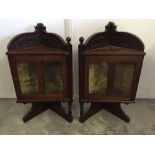 2 matching dark wood corner cupboards with carved detail and bevelled glass in the doors. 51cm