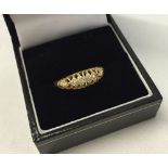 Hallmarked 18ct gold ladies ring set with 5 diamonds on a decorative open mount. Size P. Weight