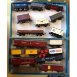 2 trays of 18 unboxed OO gauge railway trucks to include milk tanker.