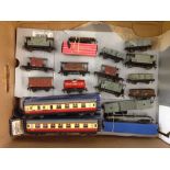 A quantity of boxed and unboxed Hornby Dublo OO gauge tin & metal coaches and trucks. (17 in
