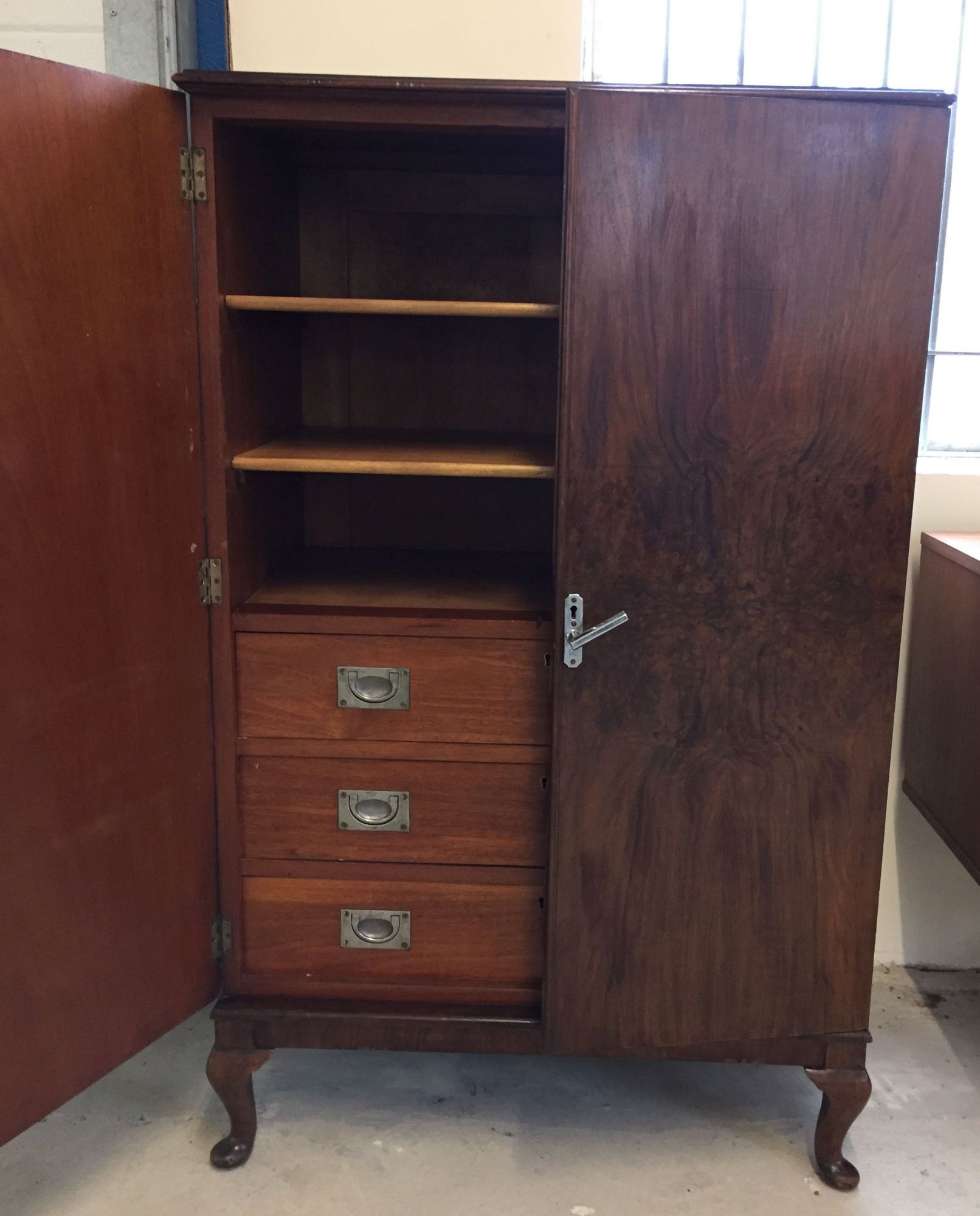 2 door veneer cabinet with 3 drawers & 3 shelves interior (approx 75cm wide x 123cm high).