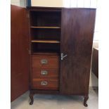 2 door veneer cabinet with 3 drawers & 3 shelves interior (approx 75cm wide x 123cm high).