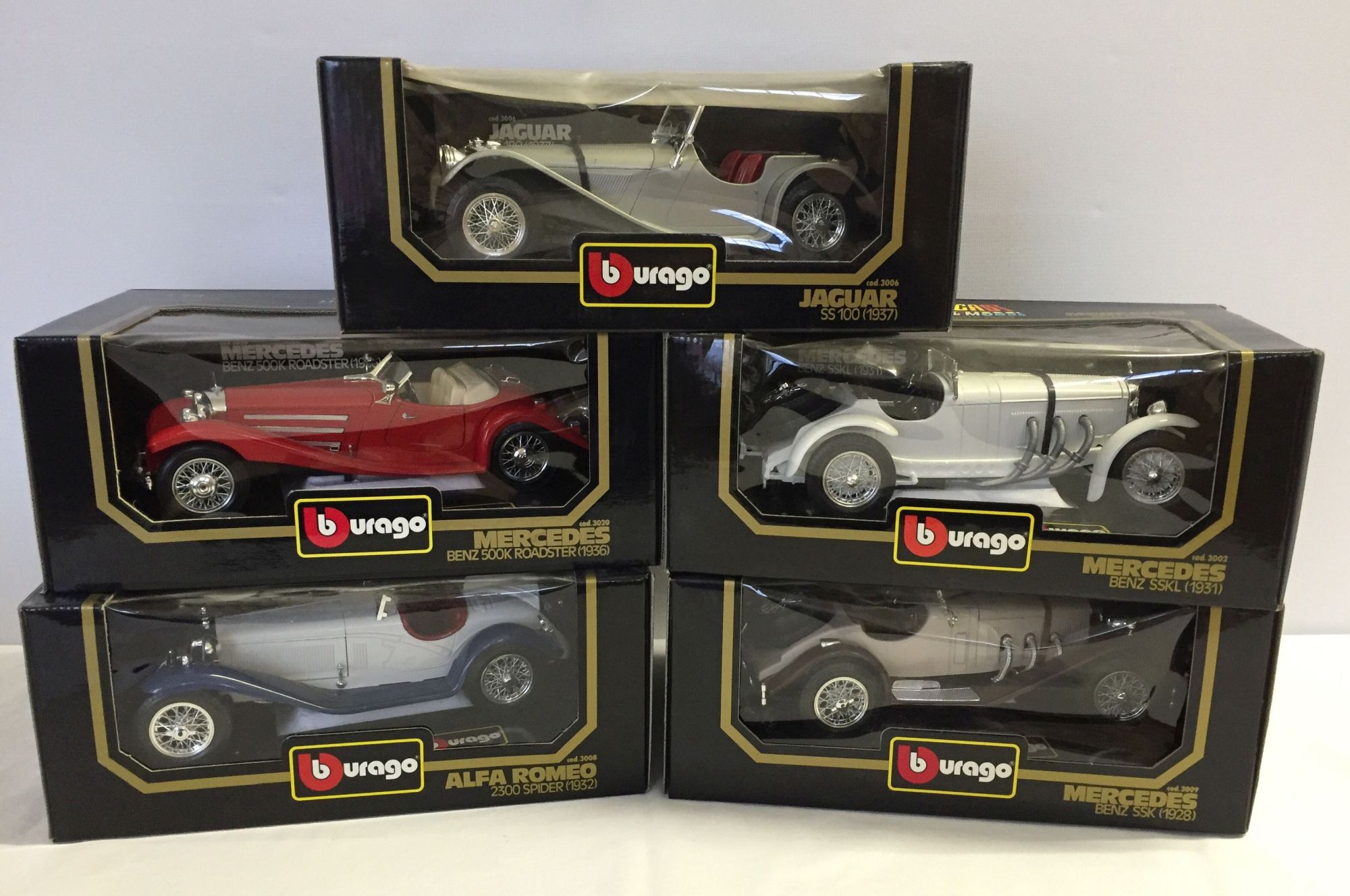 5 boxed Bburago 1:18 & 1:20 scale classic sports cars.