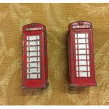 2 Dinky telephone boxes.