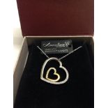Annaleece by Devries twin heart, 2 tone pendant and chain with Swarovski crystals. As new in