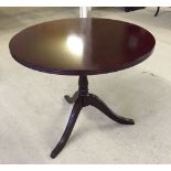 Dark wood tripod wine table by Marks & Spencer.