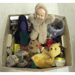A box of vintage toys, books, teddies and a large jar of marbles.