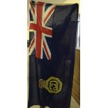 A vintage HM Coastguard blue ensign flag 81 x 178cm (2' 8" x 5' 10") with letter of provenance