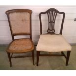 Cane seated bedroom chair with a mahogany upholstered chair.