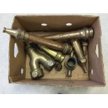 A box of vintage brass and copper fire engine hose ends and findings