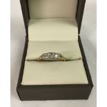 An 18ct gold ring set with 5 diamonds size P1/2 approx 2.8g