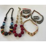 2 stylish statement necklaces, believed to be Jaeger but labels missing. One with large red beads