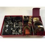 2 trays of quality costume jewellery. One in monochrome designs including necklaces, bangles &