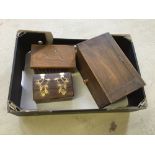 3 wooden boxes, one with brass hinges and one with painted bird decoration.