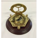 A reproduction brass equinoctial sundial. A commemorative piece from 'The Discovery of America'