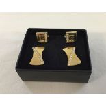2 pairs of designer goldtones & diamante earrings by Givenchy. Larger pair on posts, the other
