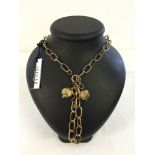 A designer large link necklace by Jaeger, London. Features 2 decorative goldtone balls and has