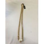 Jaeger long large link goldtone necklace with a big faux pearl pendant. Has original label.