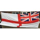 A large white ensign flag from the decommissioned aircraft carrier HMS Invincible (scrapped 2010).