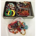 A large quantity of vintage plastic jewellery. Total weight approx 2kg.
